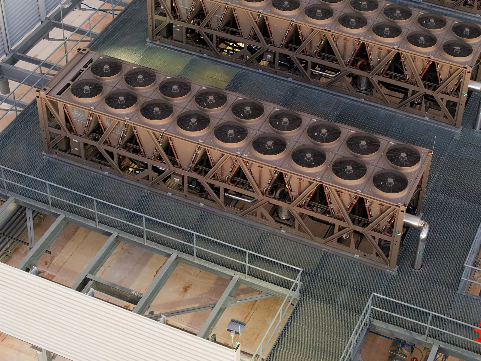 Rows of large fans on the roof of a data centre
