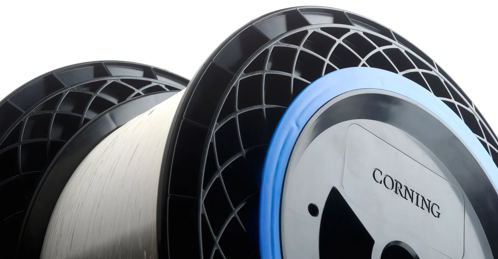 Large spools of optical fibre with the Corning logo