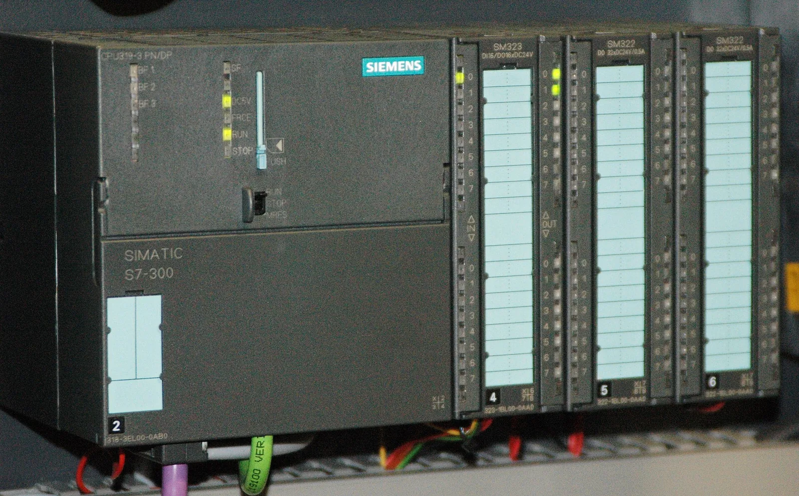 A Siemens SIMATIC S7-300 programmable logic controller with its input and output modules